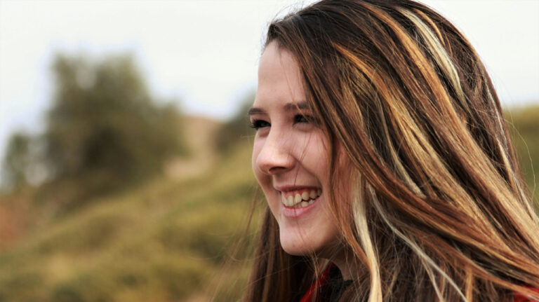 Maria Santos smiling outdoors