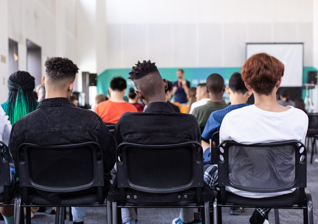 People seated at an epilepsy education event