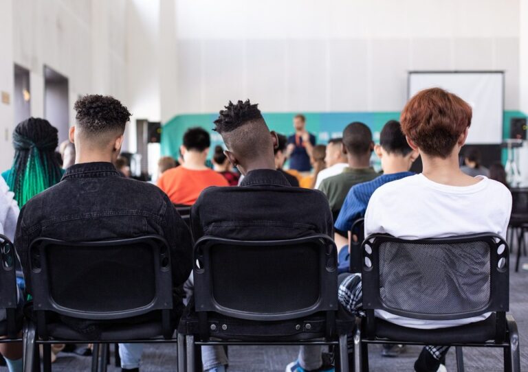People seated at an epilepsy education event